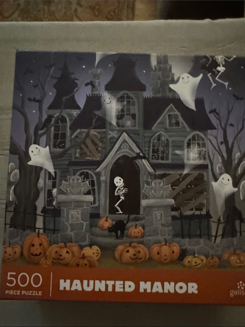 Haunted Manor 500-Piece Jigsaw Puzzle - Purple & Orange Halloween Scene